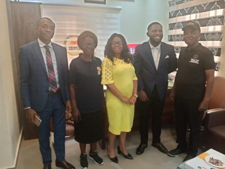 The HTWC team with partners on an office visit