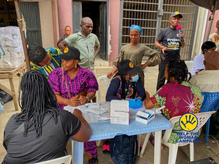Health checks at a market outreach table