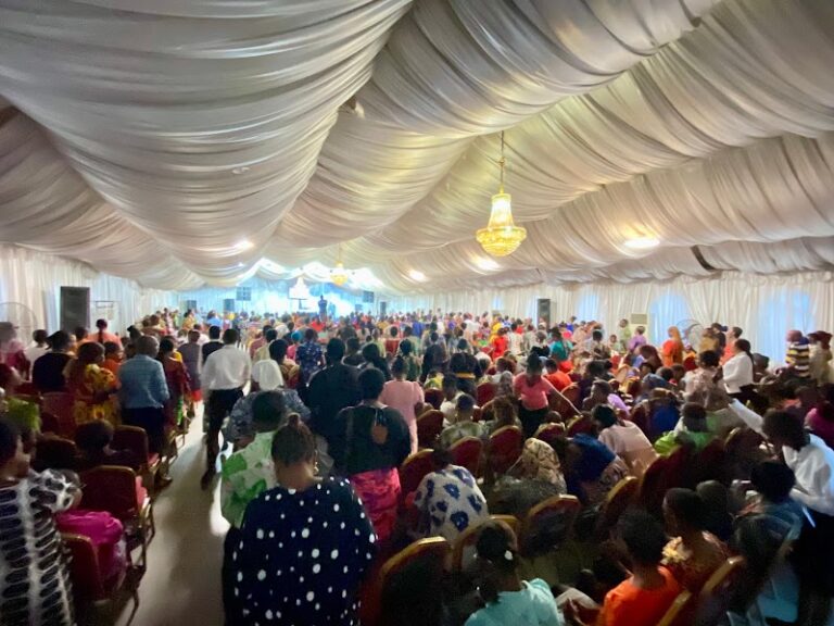 A full hall at an HTWC welfare outreach