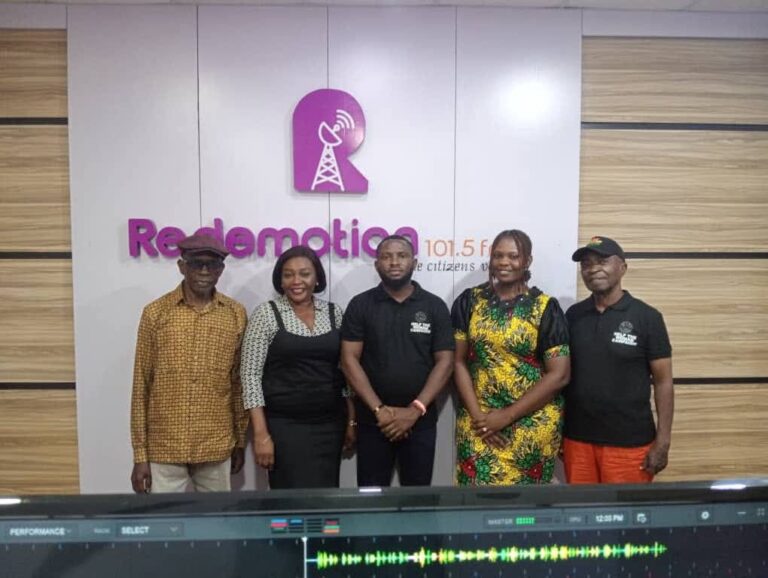 The HTWC team in a radio studio for a health education programme
