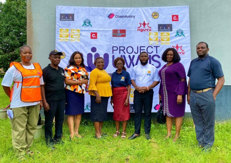 The Project UWUS team and partners at the campaign backdrop